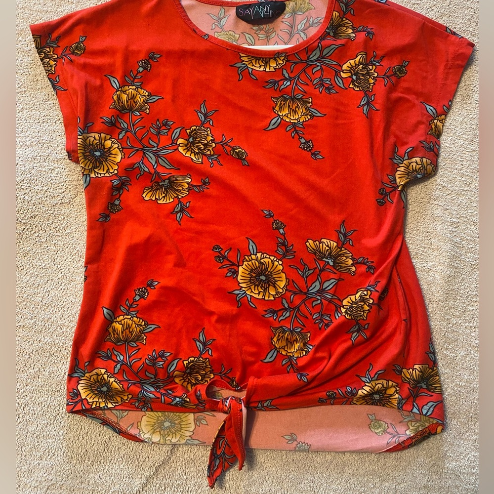 Red floral top in size Small